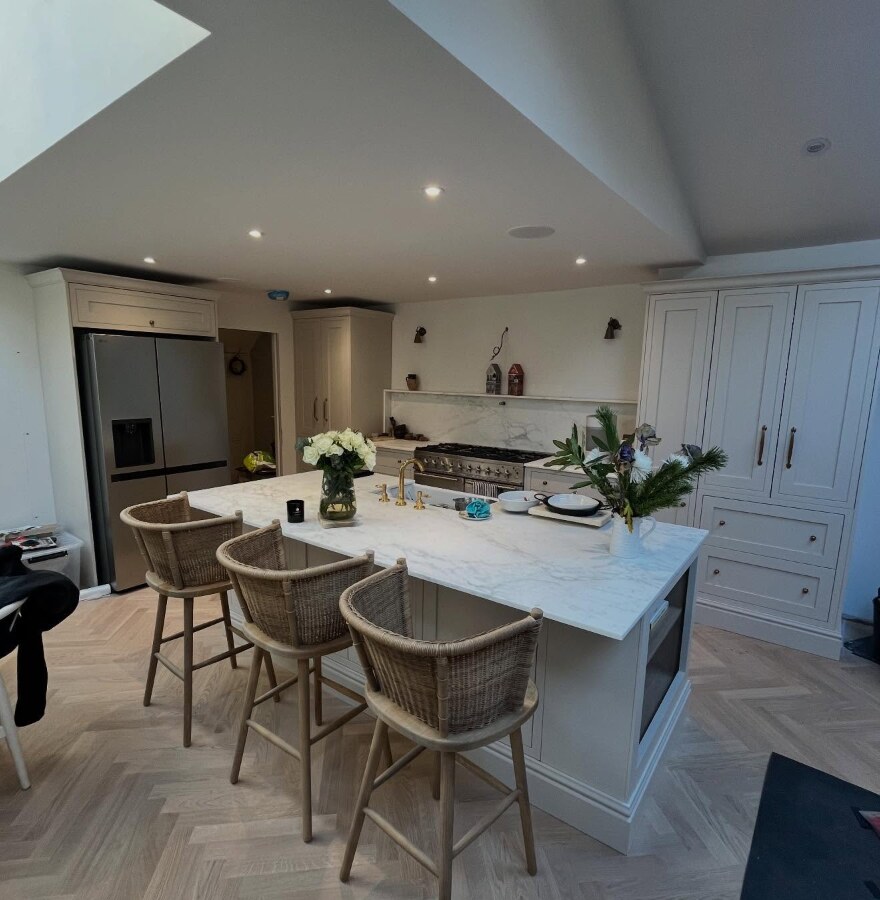 Completed London kitchen with island, cabinetry and worktops